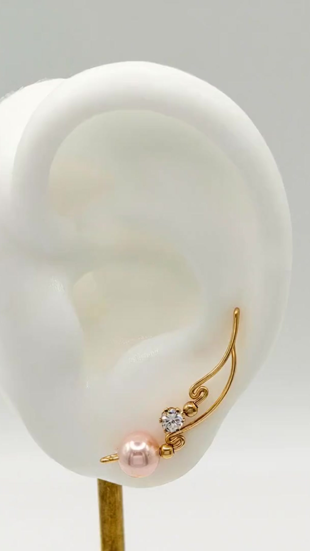 Handcrafted Dolce Collection Ear-Up™ featuring lustrous Pink Pearl Beads accented with Cubic Zirconia on 14/20KT Gold-Filled wire. Elegant ear climber jewelry handcrafted by Silvia Iglesias.