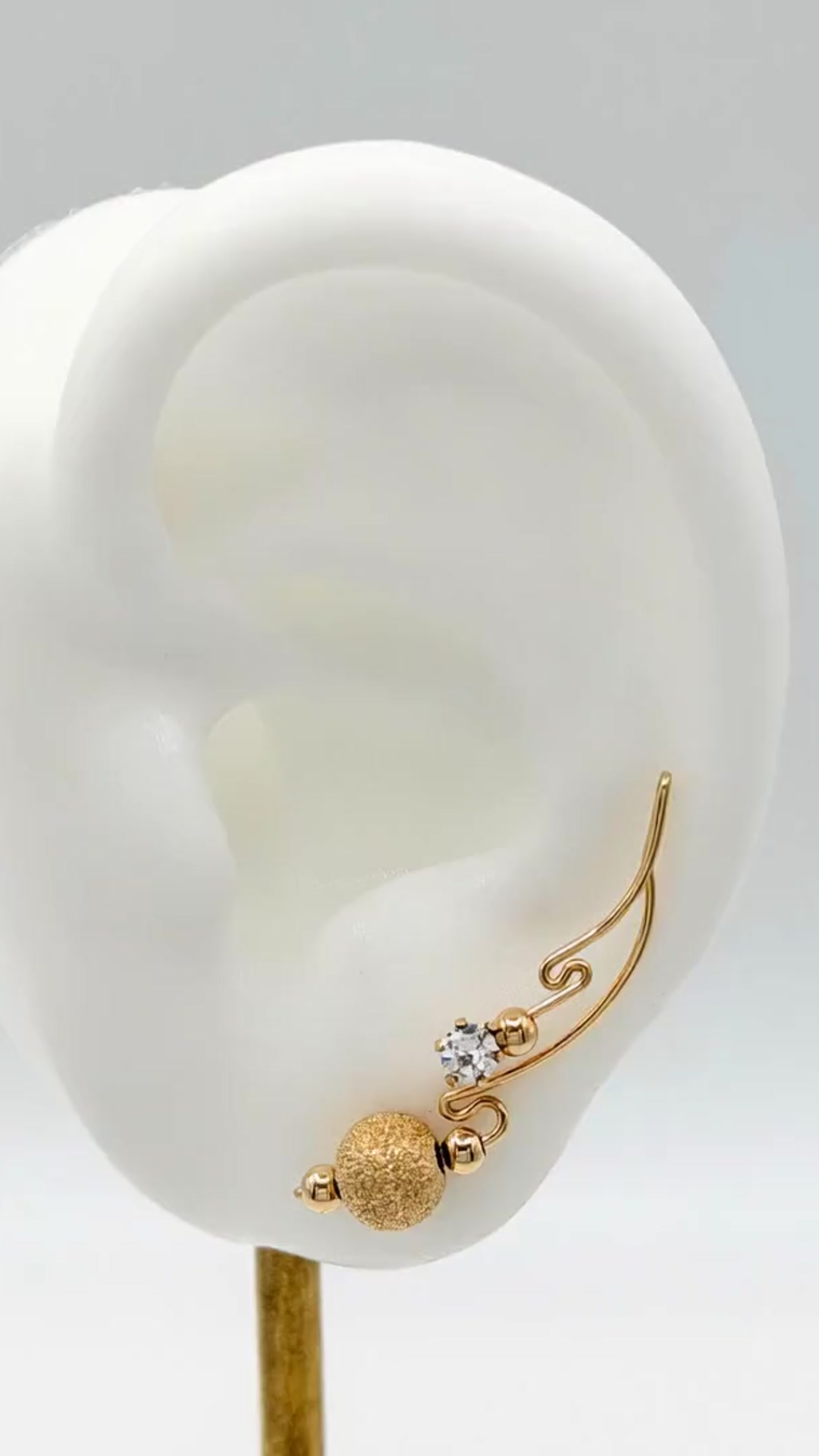 Handcrafted Dolce Collection Ear-Up™ featuring sparkling Cubic Zirconia and textured 14/20KT Gold-Filled Stardust Beads on 14/20KT Gold-Filled wire. Elegant ear climber jewelry handcrafted by Silvia Iglesias.