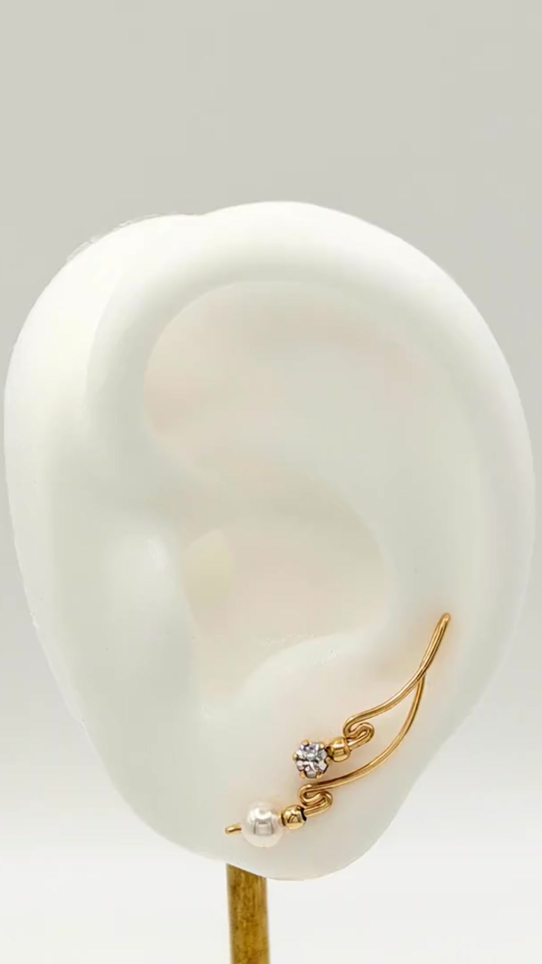 Handcrafted Dolce Collection Ear-Up™ featuring sparkling Cubic Zirconia and luminous Pearl beads on 14/20KT Gold-Filled wire. Elegant ear climber jewelry handcrafted by Silvia Iglesias.