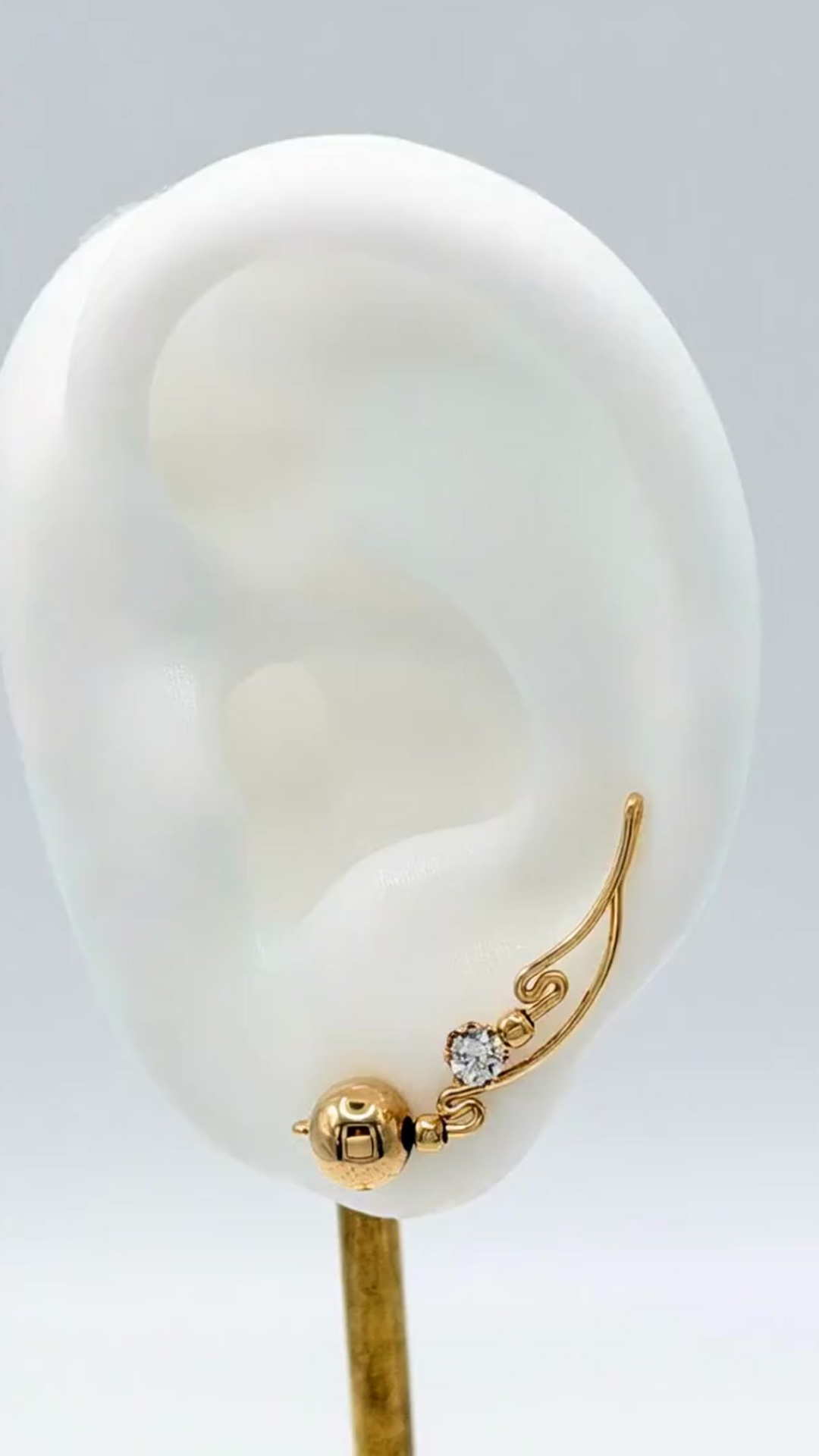 Handcrafted Dolce Collection Ear-Up™ featuring polished 14/20KT Gold-Filled Beads accented with sparkling Cubic Zirconia on 14/20KT Gold-Filled wire. Elegant handcrafted ear climber jewelry designed by Silvia Iglesias.