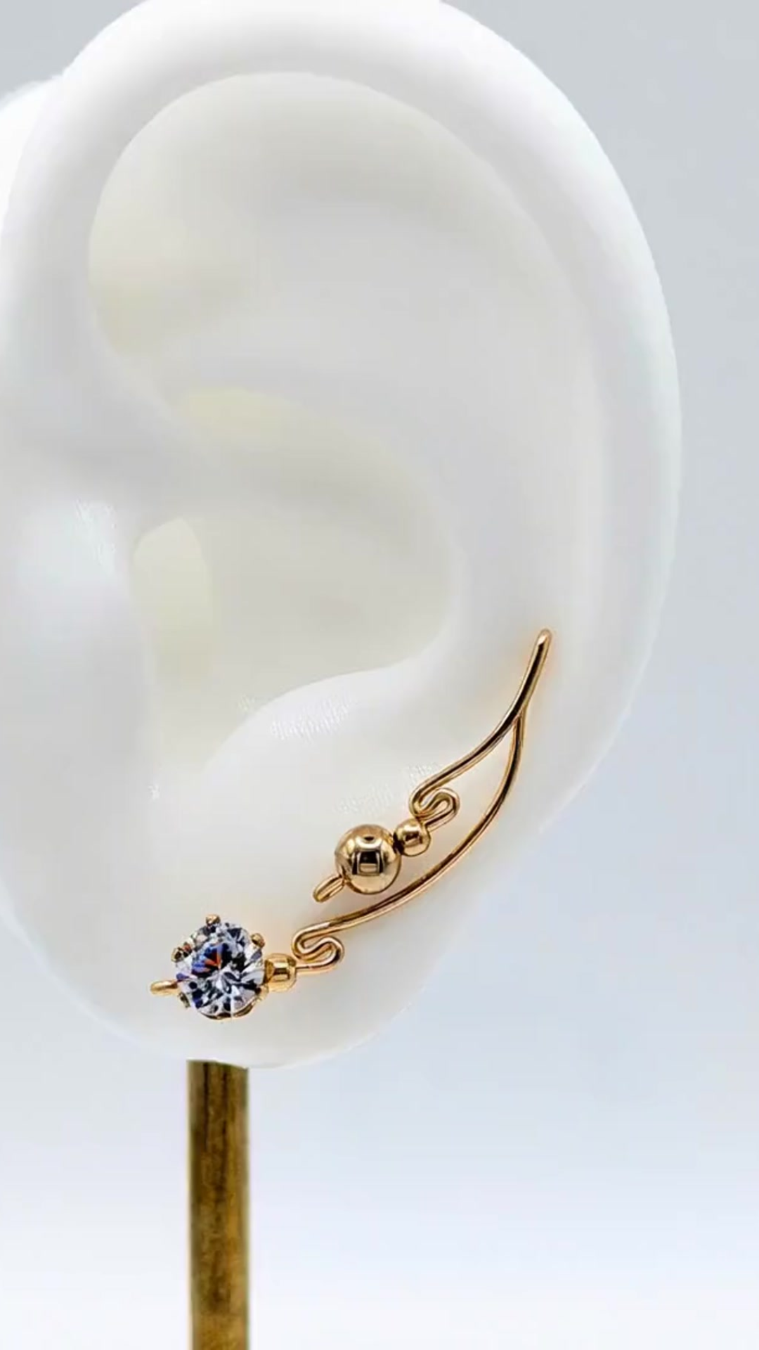 Handcrafted Dolce Collection Ear-Up™ featuring sparkling Clear Cubic Zirconia and polished 6mm 14/20KT Gold-Filled Beads on 14/20KT Gold-Filled wire. Elegant ear climber jewelry handcrafted by Silvia Iglesias.
