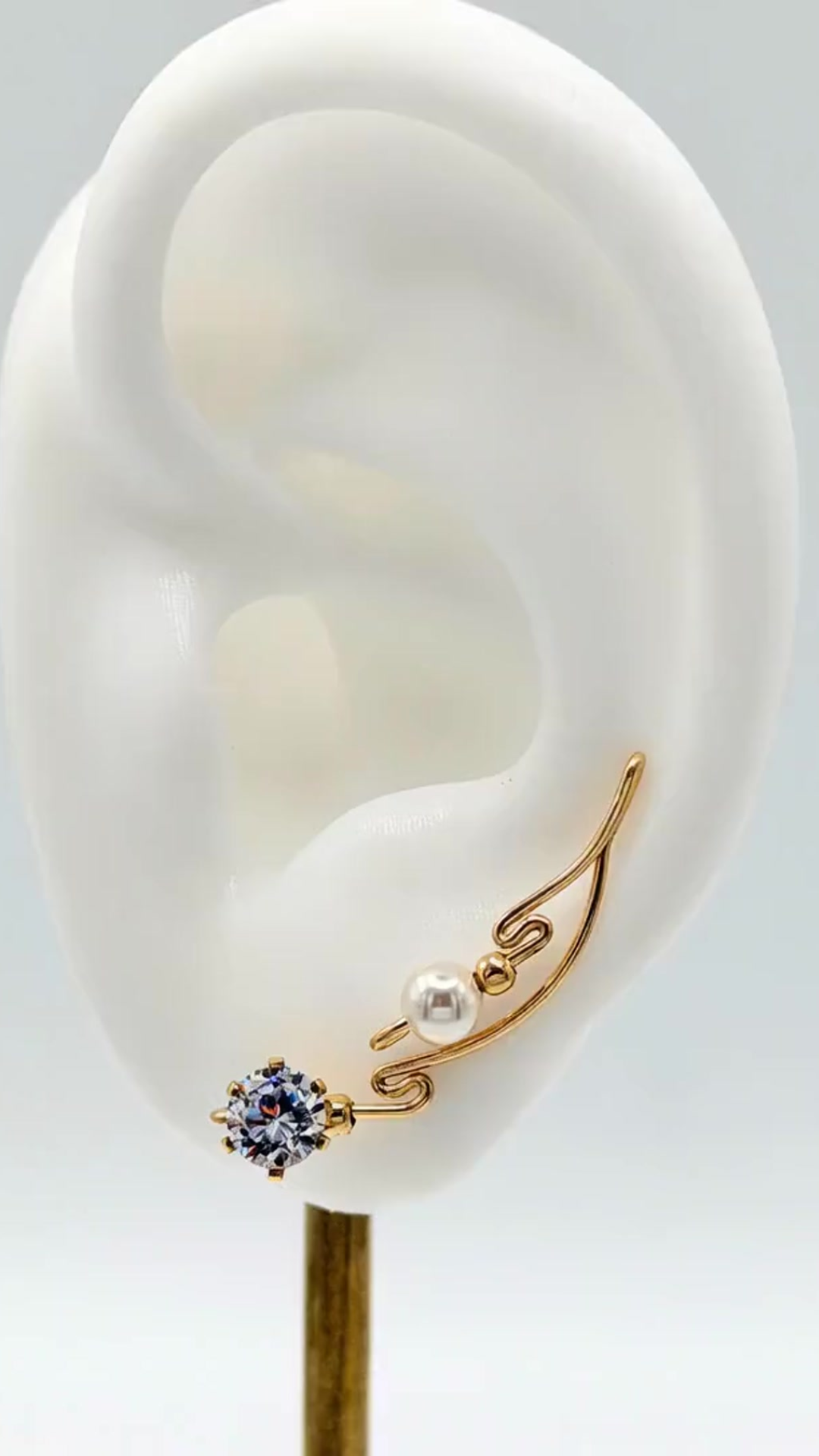Handcrafted Dolce Collection Ear-Up™ featuring sparkling Clear Cubic Zirconia and luminous 6mm Pearl Beads on 14/20KT Gold-Filled wire. Elegant ear climber jewelry handcrafted by Silvia Iglesias.