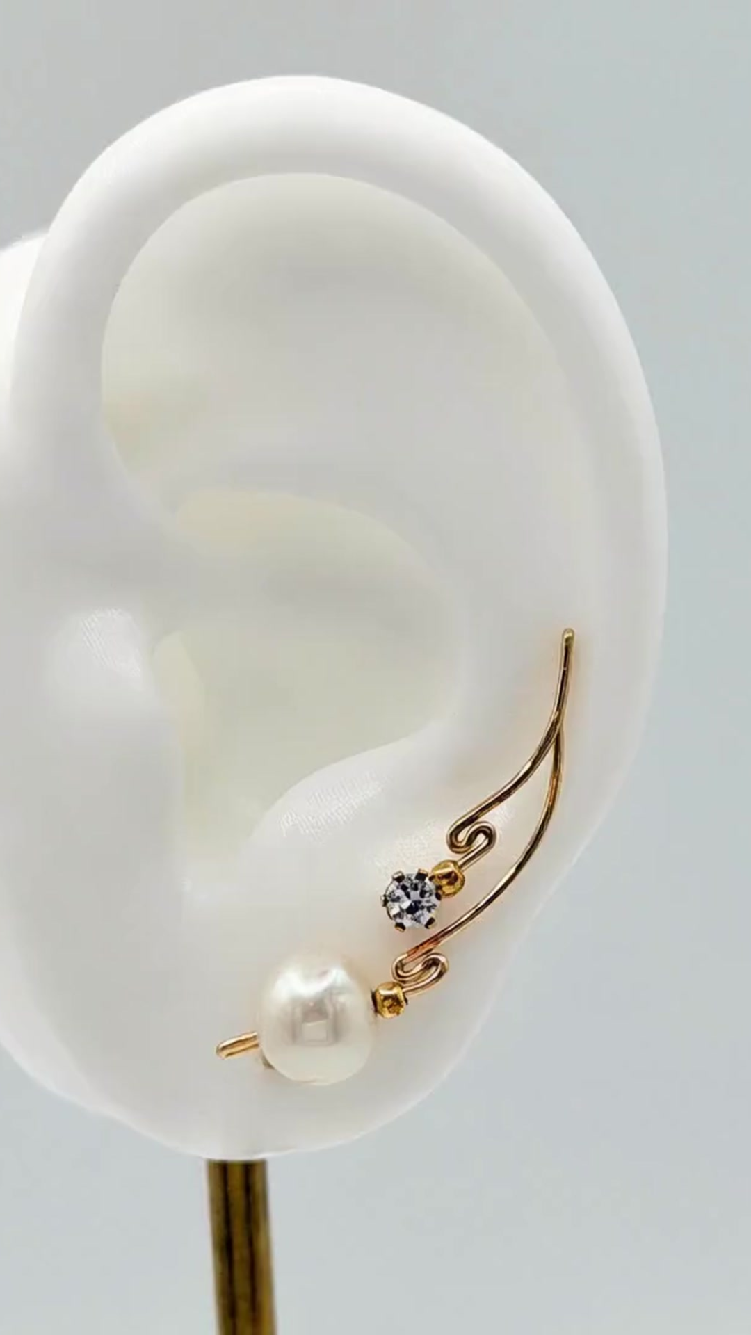 Handcrafted Dolce Collection Ear-Up™ featuring sparkling Clear Cubic Zirconia and luminous 8mm Pearl Beads on 14/20KT Gold-Filled wire. Elegant ear climber jewelry handcrafted by Silvia Iglesias.