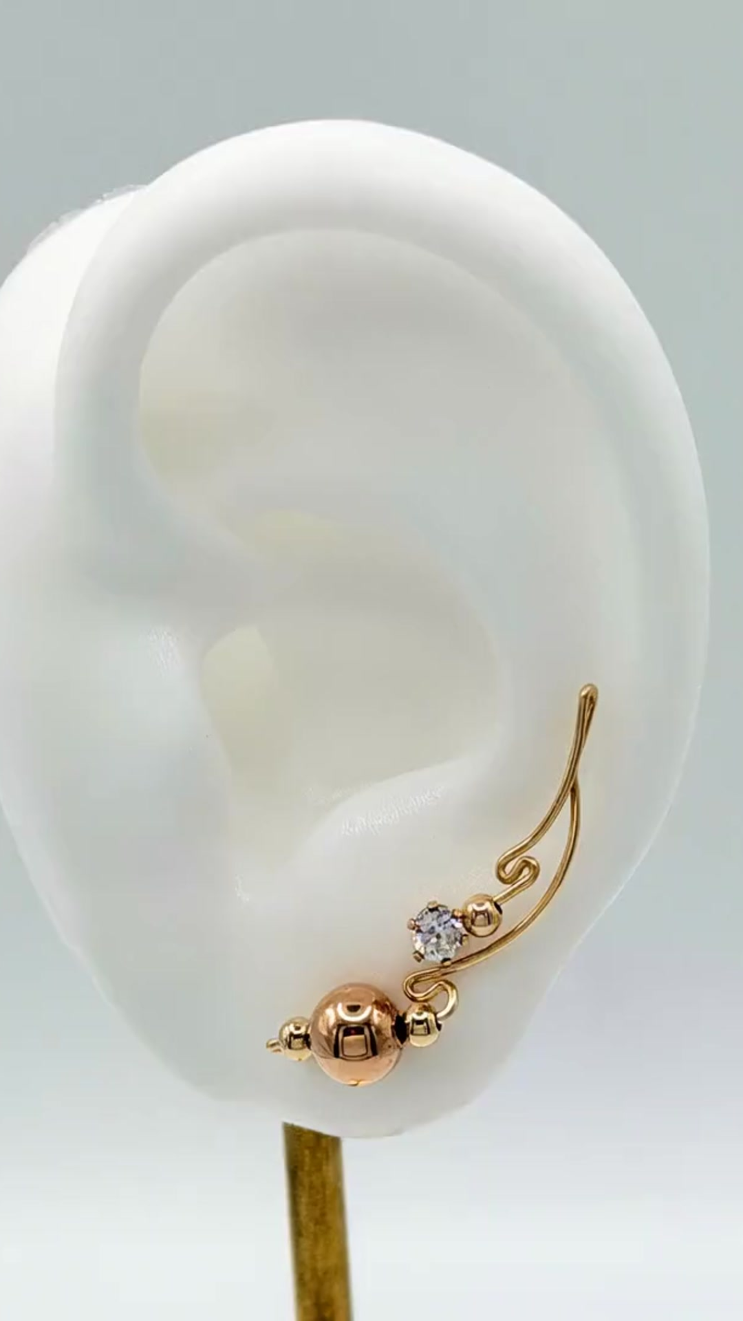 Handcrafted Dolce Collection Ear-Up™ featuring sparkling Clear Cubic Zirconia and polished 8mm Rose Gold-Filled Beads on 14/20KT Gold-Filled wire. Elegant ear climber jewelry handcrafted by Silvia Iglesias.