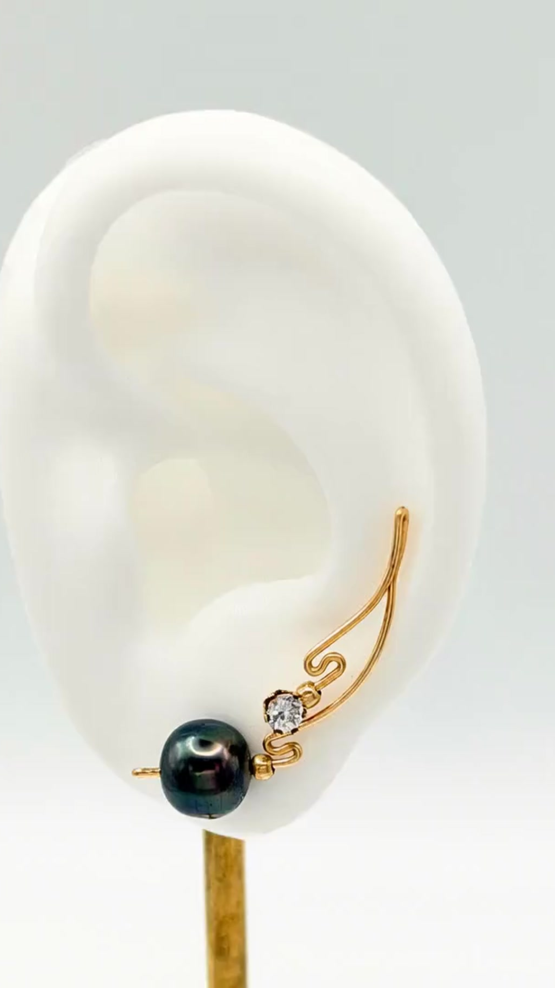 Handcrafted Dolce Collection Ear-Up™ featuring sparkling Clear Cubic Zirconia and lustrous 8mm Tahitian Pearl Beads on 14/20KT Gold-Filled wire. Elegant ear climber jewelry handcrafted by Silvia Iglesias.