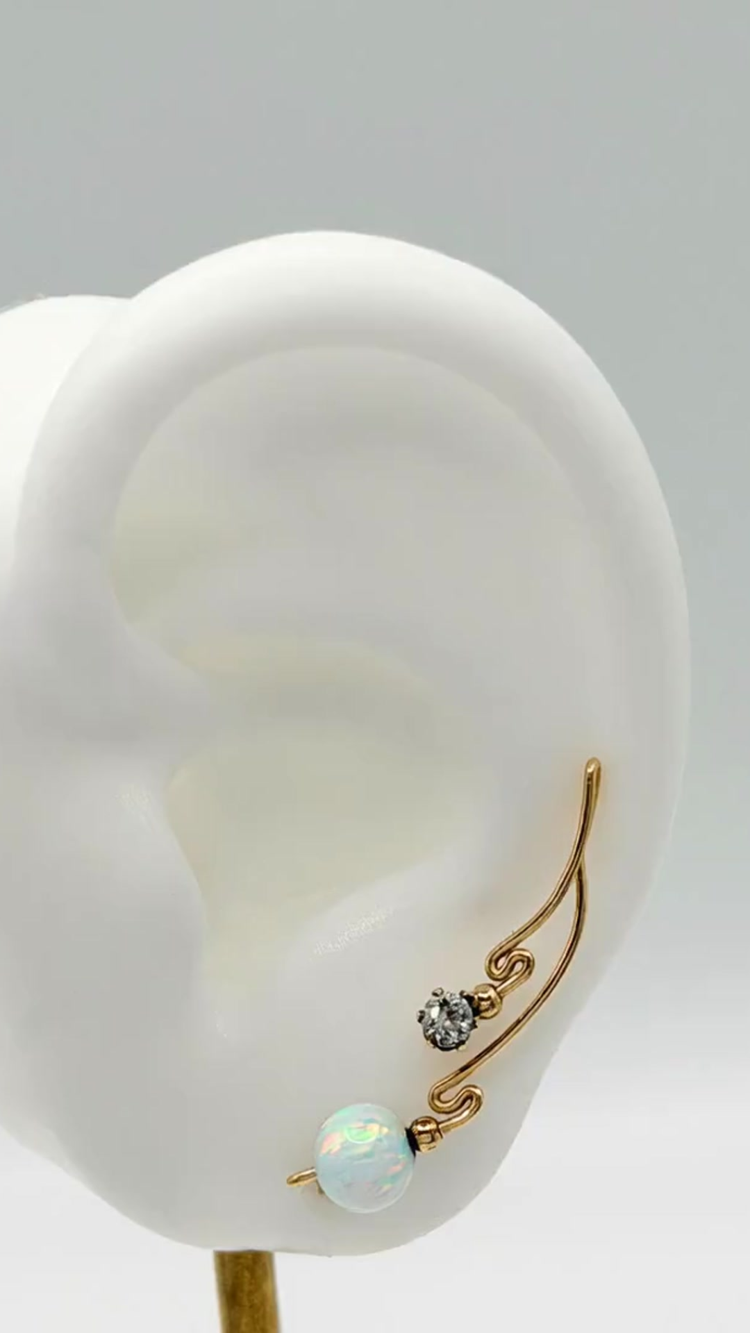 Handcrafted Dolce Collection Ear-Up™ featuring sparkling Clear Cubic Zirconia and luminous 8mm White Opal Beads on 14/20KT Gold-Filled wire. Elegant ear climber jewelry handcrafted by Silvia Iglesias.