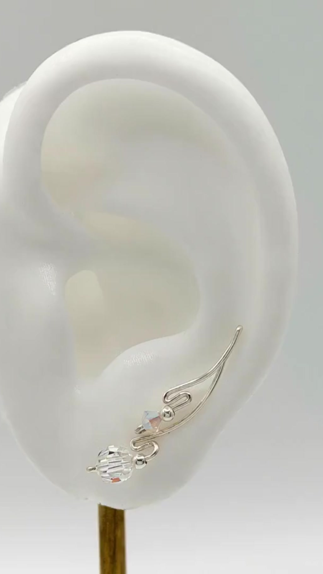 Handcrafted Dolce Collection Ear-Up™ featuring a Clear Round Crystal and Aurora Borealis Crystal Beads on .925 Sterling Silver wire. Elegant handcrafted Ear-Up™ jewelry designed by Silvia Iglesias.