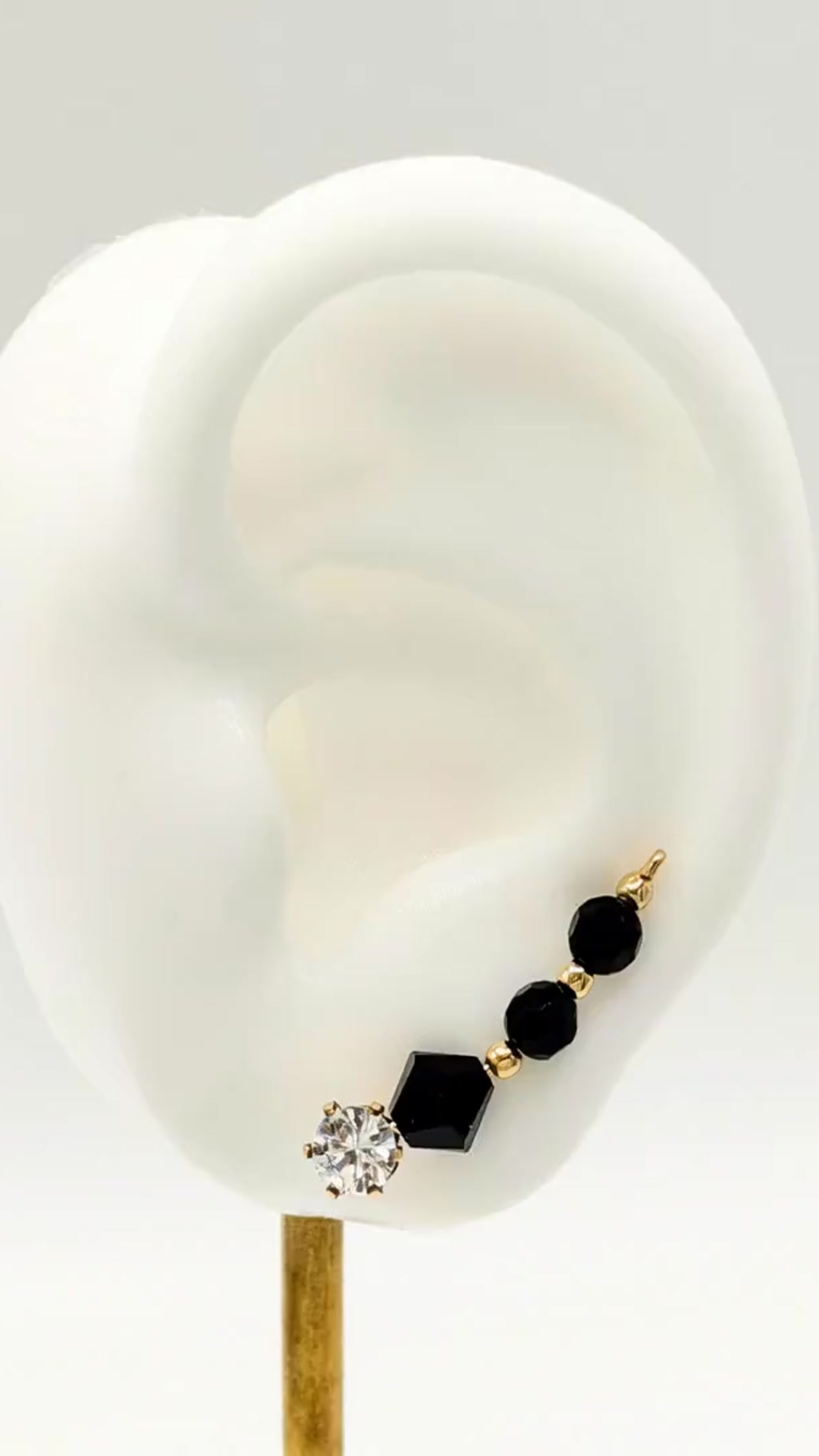 Handcrafted Grazia Collection Ear-Up™ featuring sparkling Clear Cubic Zirconia and faceted Black Jet Crystal Beads on 14/20KT Gold-Filled wire. Elegant handcrafted ear jewelry designed by Silvia Iglesias.